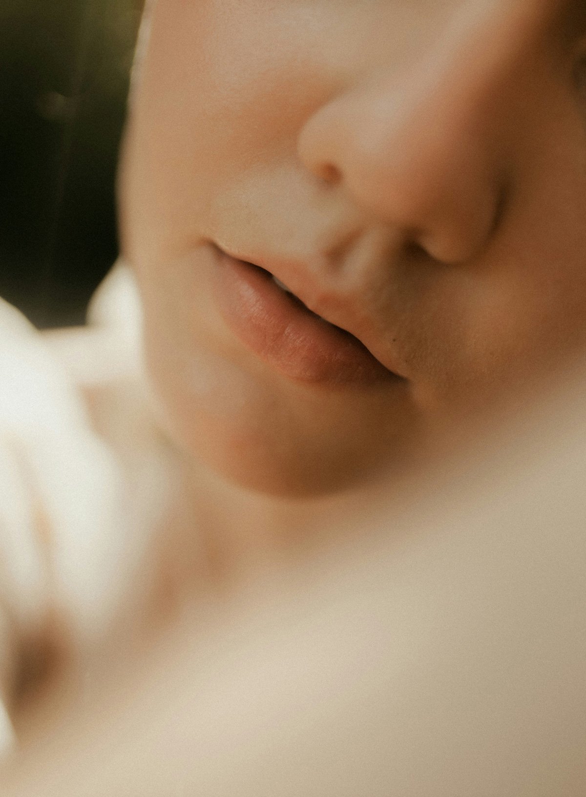 Close-up of a woman's lips and chin