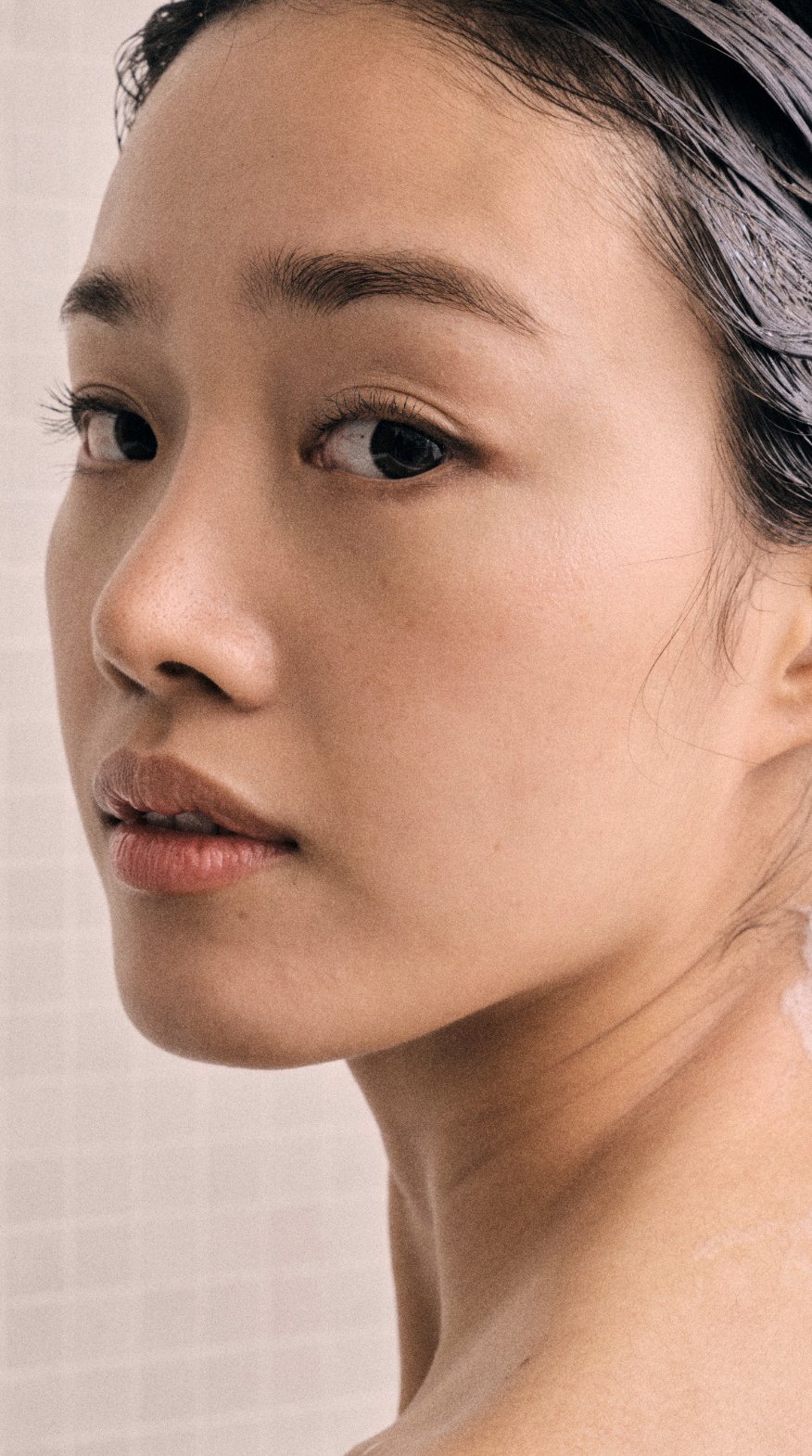 Woman looking over her shoulder
